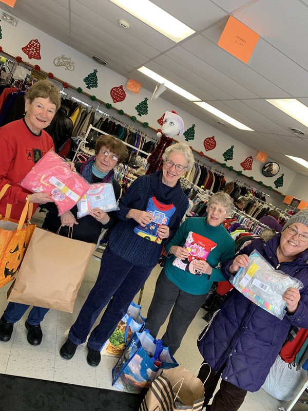 Clothing Closet volunteers with PJs